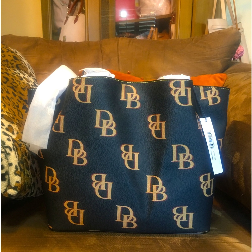 Brand new charcoal Monogram Flynn shoulder bag by Dooney & Bourke